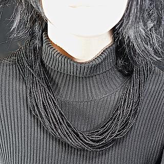 Naga small black multistrand glass bead necklace 04.04.1978