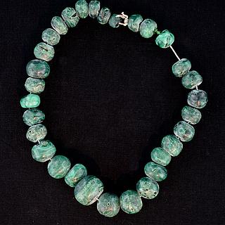 A swing of dark green ( Jade?) stones  05.17.1550