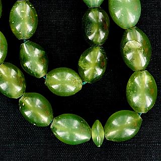 String of 33 vintage glass (Jade? beads 05.17.1528