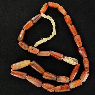 Necklace with 27 ancient carnelian beads 05.04.944