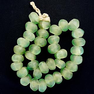 A strand of very large translucide green glass beads 05.11.977