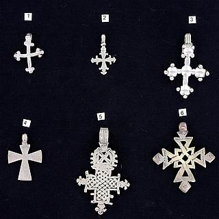Set of four Ethiopian cross pendants 02.06.464