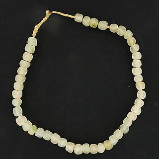 Strand of white Ghaneen glass beads 05.11.923
